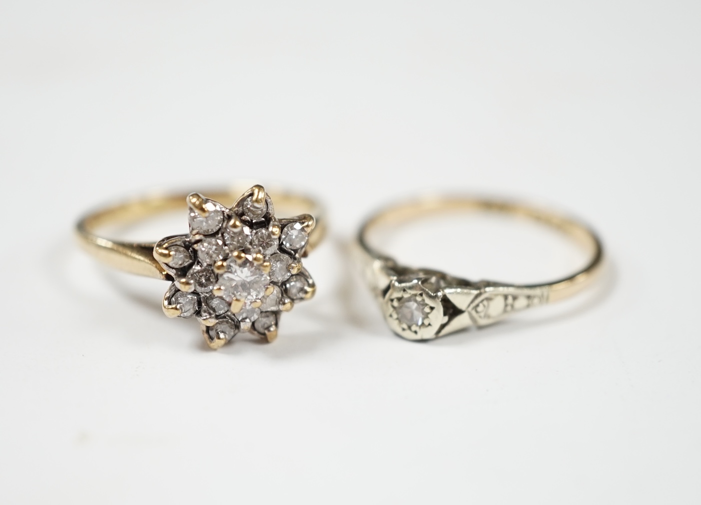 A modern 9ct gold and diamond cluster set ring, size L and a 9ct and illusion set diamond ring, gross weight 4.4 grams. Condition - poor to fair